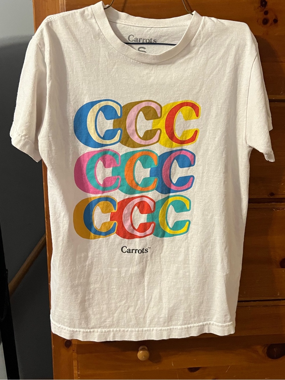 Men’s white Tshirt with Multicolor “C” (Carrots) print